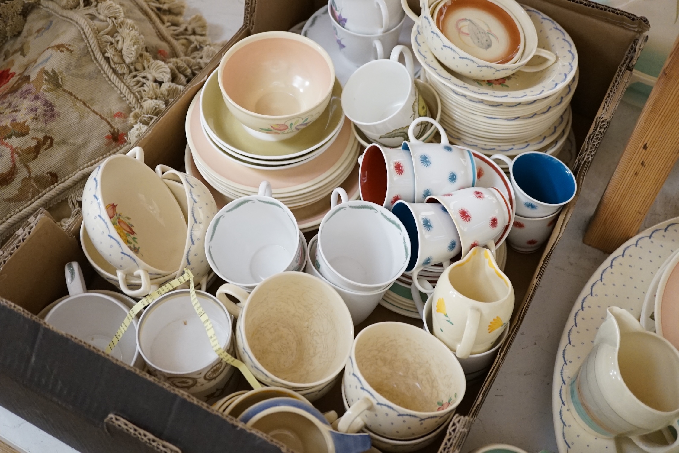 A collection of Susie Cooper ceramics and tablewares including tureens, an oval platter, cups and saucers